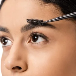 attractive-smiling-african-american-girl-combing-e-2024-11-12-09-06-48-utc-1-copy-scaled